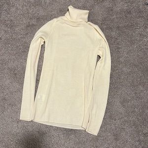 Barely worn 100% Wool Crème Turtleneck Sweater